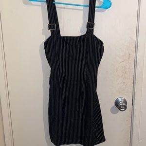 Adorable black dress with buckle straps!